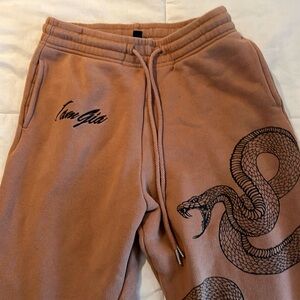 Brown IAMGIA sweatpants size small with snake detail